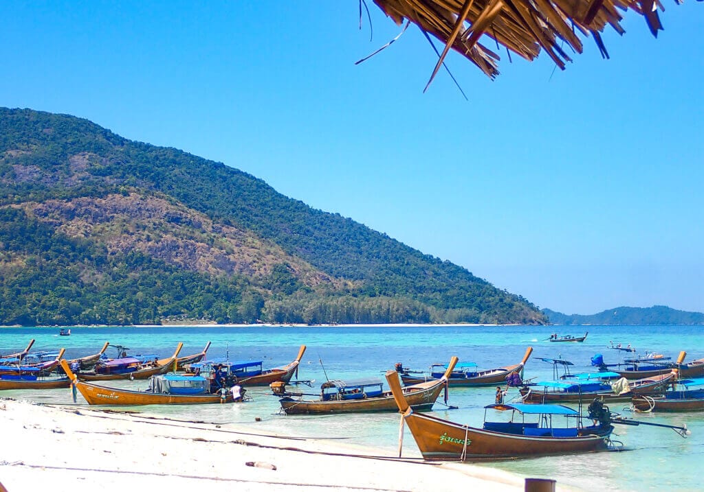 10 Best Snorkel Spots Koh Lipe 5 Sunrise Beach Longtail Boats