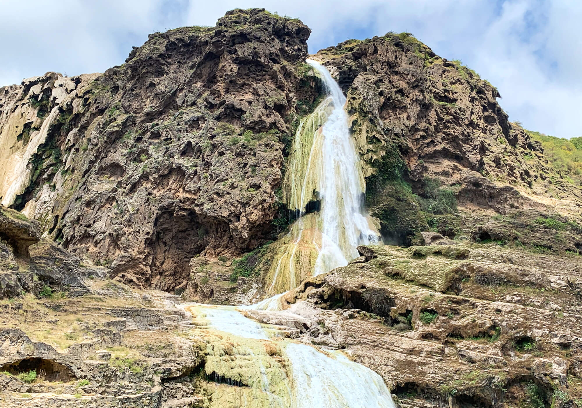 Wadi Dharbat Travertine Curtain Waterfall, Salalah, Oman